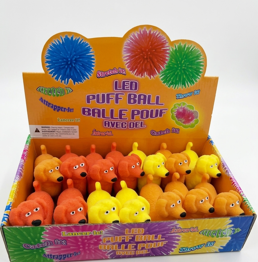 LED puff ball dog squeeze toy orange and yellow colors lights up