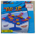 Box of a children's game called 'Topple' with colorful design and text.