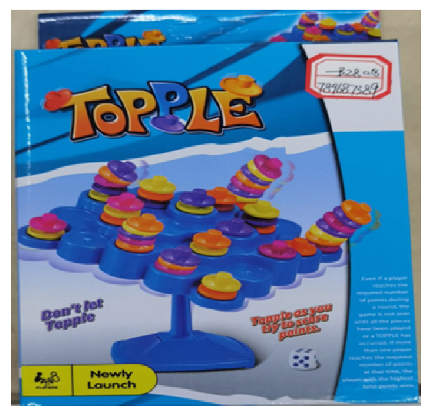 Box of a children's game called 'Topple' with colorful design and text.
