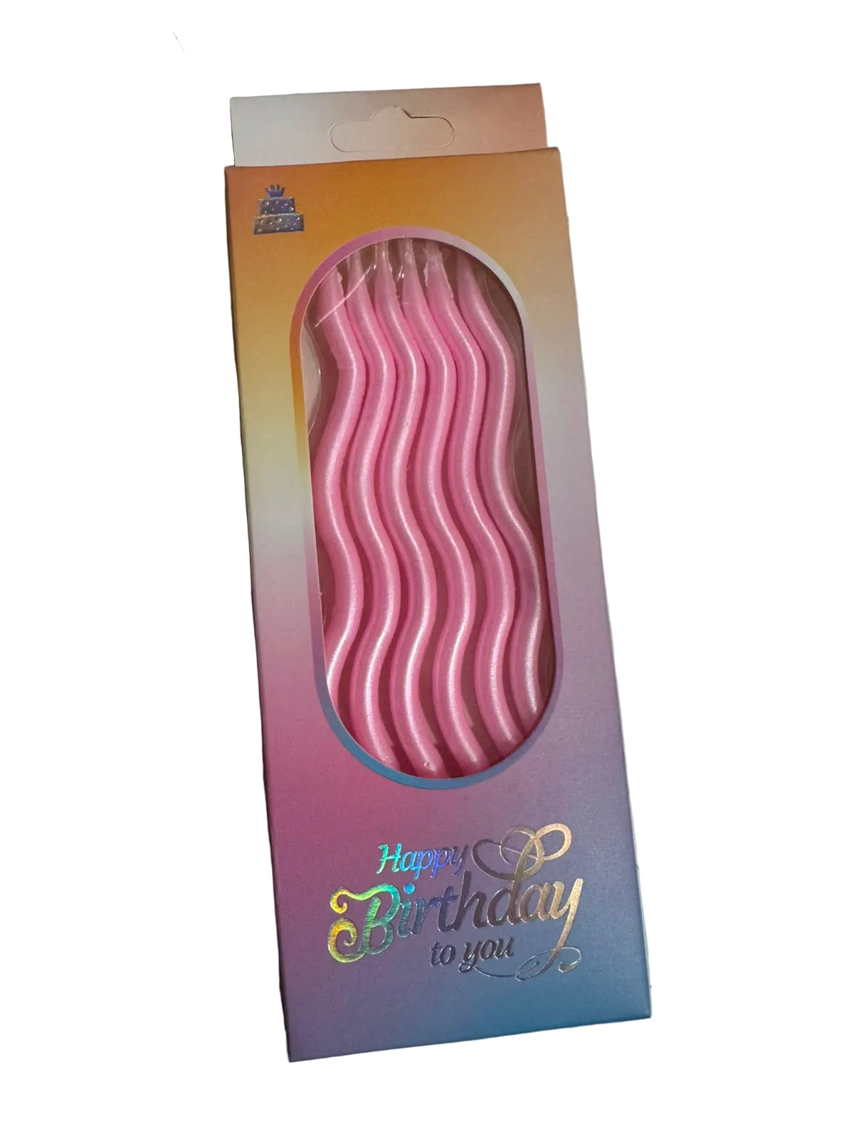 Packaged pink birthday candles on a white surface