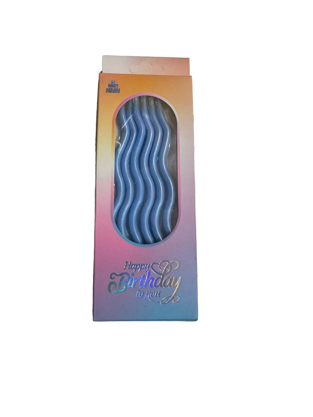 Box of birthday candles on a white surface
